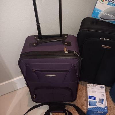 LUGGAGE, EURO OUTLET ADAPTERS, TRAVEL IRON AND BLOOD PRESSURE MONITOR