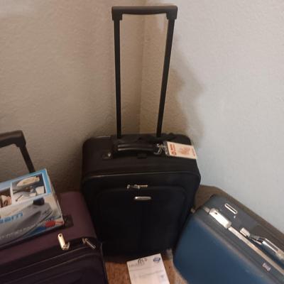 LUGGAGE, EURO OUTLET ADAPTERS, TRAVEL IRON AND BLOOD PRESSURE MONITOR