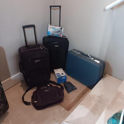 LUGGAGE, EURO OUTLET ADAPTERS, TRAVEL IRON AND BLOOD PRESSURE MONITOR