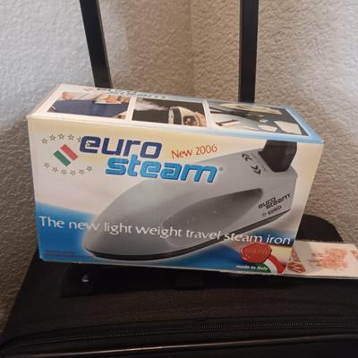 LUGGAGE, EURO OUTLET ADAPTERS, TRAVEL IRON AND BLOOD PRESSURE MONITOR