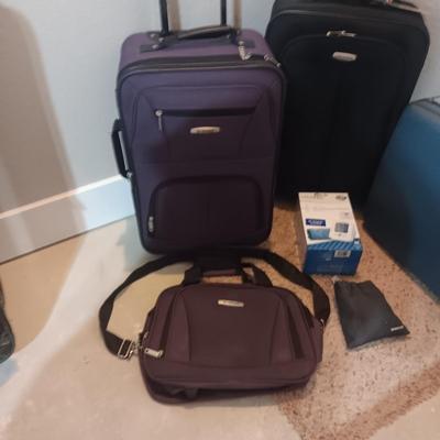 LUGGAGE, EURO OUTLET ADAPTERS, TRAVEL IRON AND BLOOD PRESSURE MONITOR