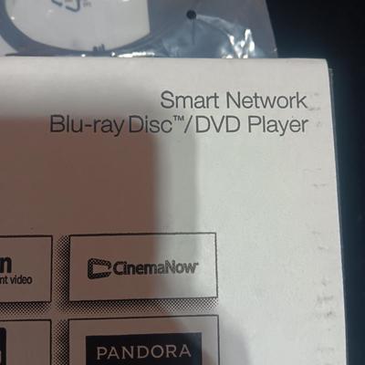 NEW PANASONIC BLU-RAY PLAYER, WALL CLOCK AND MOVIES ON DVD'S