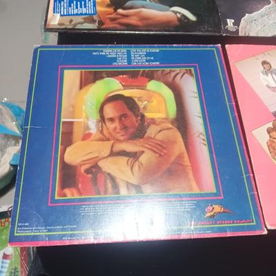 4 VINYL RECORDS