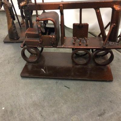 Four Copper Metal Statues