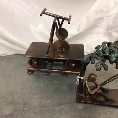 Four Copper Metal Statues