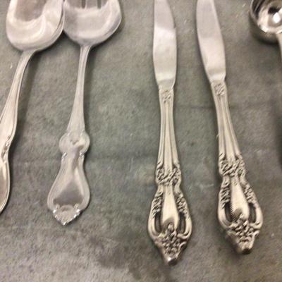 Two Sets of Silverware Sets