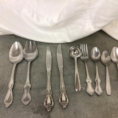 Two Sets of Silverware Sets