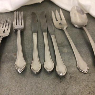Two Sets of Silverware Sets