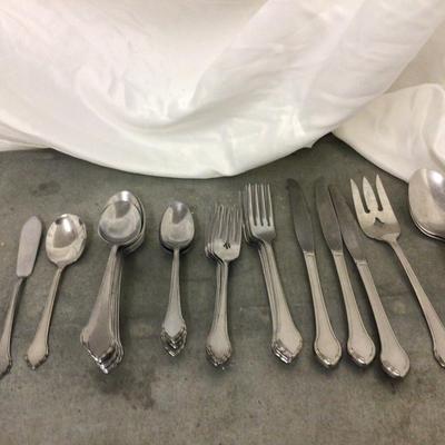 Two Sets of Silverware Sets