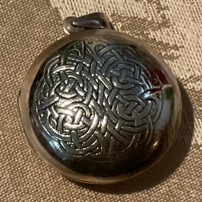 925 Sterling locket has Celtic knot on one side prayer on other side
