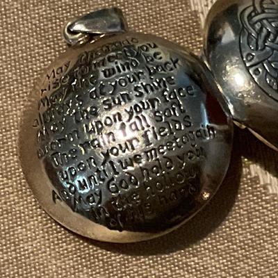 925 Sterling locket has Celtic knot on one side prayer on other side