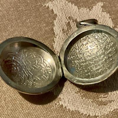 925 Sterling locket has Celtic knot on one side prayer on other side