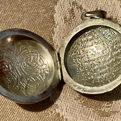 925 Sterling locket has Celtic knot on one side prayer on other side