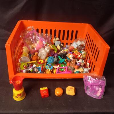 A VARIETY OF MOSTLY MCDONALD'S HAPPY MEAL TOYS