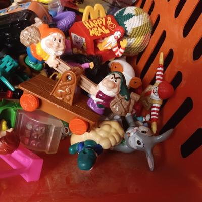 A VARIETY OF MOSTLY MCDONALD'S HAPPY MEAL TOYS