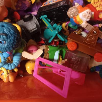 A VARIETY OF MOSTLY MCDONALD'S HAPPY MEAL TOYS