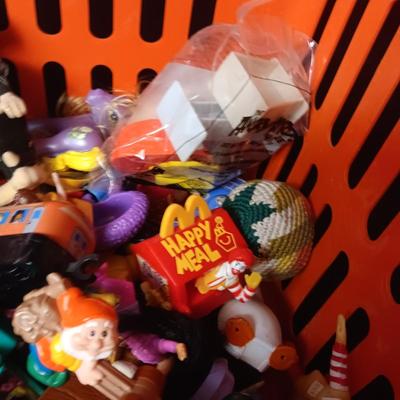 A VARIETY OF MOSTLY MCDONALD'S HAPPY MEAL TOYS