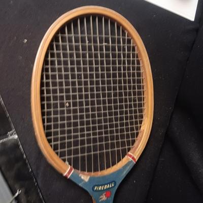 PRETEND SWORDS, WATER SQUIRTERS AND A WOODEN TENNIS RACQUET