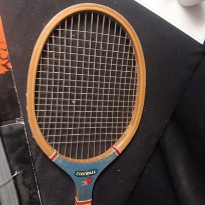 PRETEND SWORDS, WATER SQUIRTERS AND A WOODEN TENNIS RACQUET