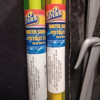 PRETEND SWORDS, WATER SQUIRTERS AND A WOODEN TENNIS RACQUET