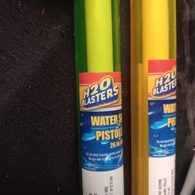 PRETEND SWORDS, WATER SQUIRTERS AND A WOODEN TENNIS RACQUET