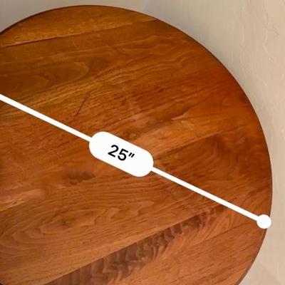 Round Antique Table with brass trim