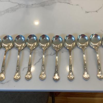 Silver- 10 luncheon knives, 10 cream soup spoon, 12 luncheon forks
