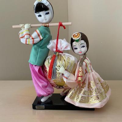 Two Korean Girls Carrying Happiness Bag
