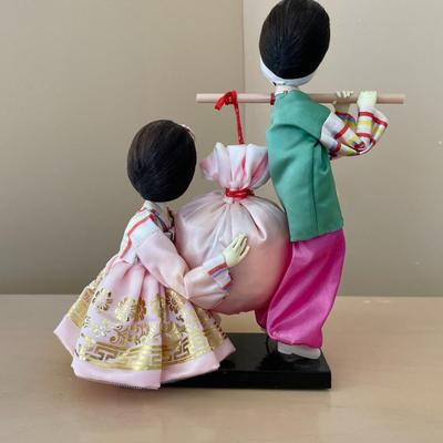 Two Korean Girls Carrying Happiness Bag