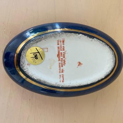Blue and White Porcelain Oval Box with lid featuring Gold Trim and Enameled Floral Motif