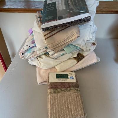 Lot of linens, curtains and sheets . ETC.