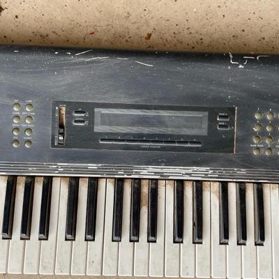 A Korg M1 61-Key Synth Music Workstation