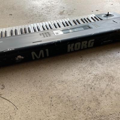 A Korg M1 61-Key Synth Music Workstation