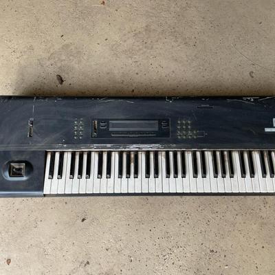 A Korg M1 61-Key Synth Music Workstation