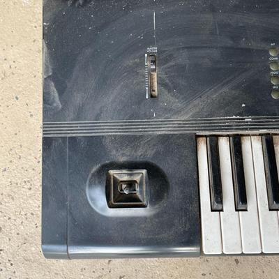 A Korg M1 61-Key Synth Music Workstation