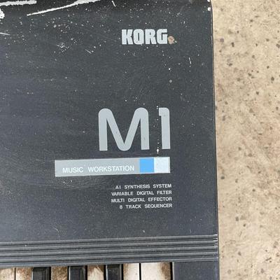 A Korg M1 61-Key Synth Music Workstation