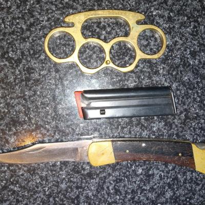 Buck knife, 22 mag, brass belt buckle