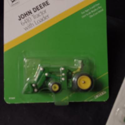 JOHN DEERE 6410 TRACTOR W/LOADER AND A 2ND TRACTOR
