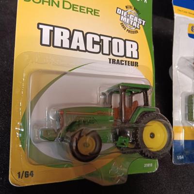 JOHN DEERE TRACTOR AND A SMALL SQUARE BALER
