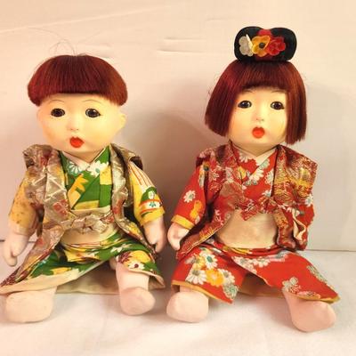 Lot #135 Pair of Asian Style Dolls - jointed