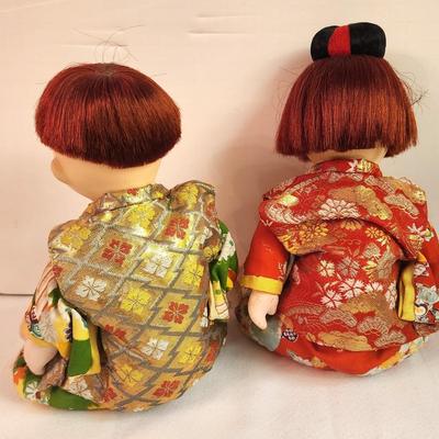 Lot #135 Pair of Asian Style Dolls - jointed
