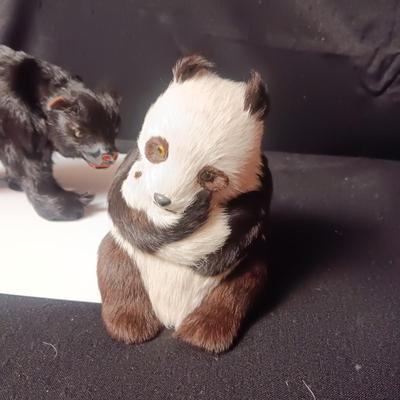 A BEAR AND PANDA WITH REAL FUR