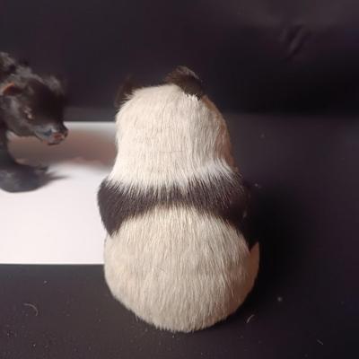 A BEAR AND PANDA WITH REAL FUR