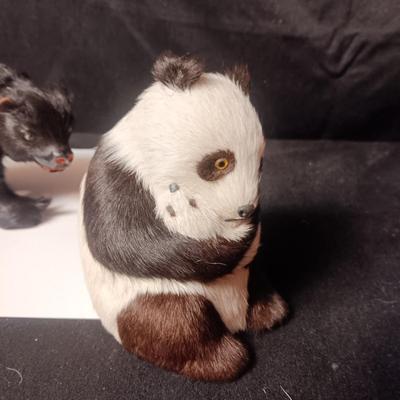 A BEAR AND PANDA WITH REAL FUR