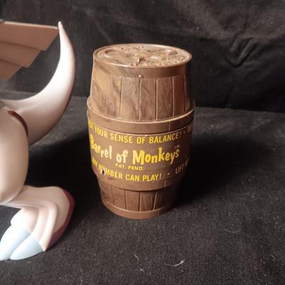 POKEMON TAKARA TOMY FIGURE AND A BARREL OF MONKEYS
