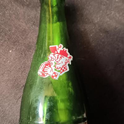 AN ASSORTMENT OF VINTAGE GLASS BOTTLES