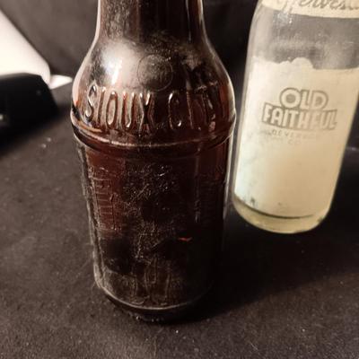 AN ASSORTMENT OF VINTAGE GLASS BOTTLES