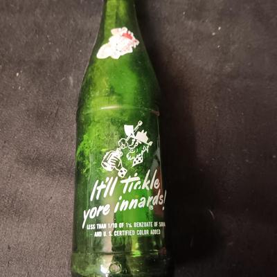 AN ASSORTMENT OF VINTAGE GLASS BOTTLES