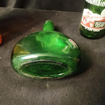 AN ASSORTMENT OF VINTAGE GLASS BOTTLES