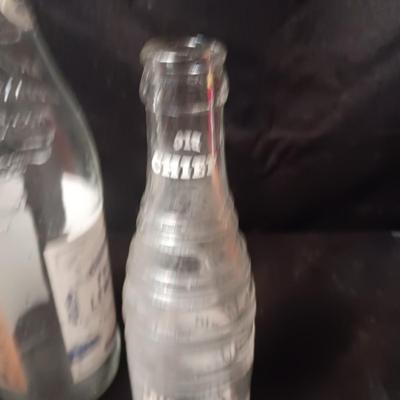 A COLLECTION OF GLASS BOTTLES